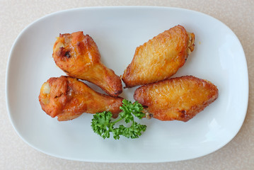 Buffalo chicken wings on white plate