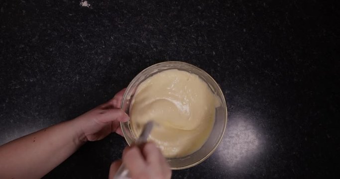 Time Lapse Of Lady Mixing Batter In Order To Prepare It For Baking 4K 30FPS - Cake, Cusine, Food