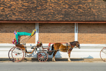 The horse carriage (horse-drawn carriage) in Lampang province of Thailand. Lampang is the only town...