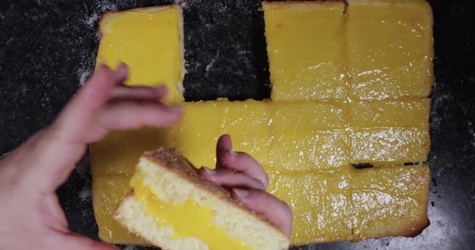 Time Lapse Of Woman Squeezing Both Sides Of Portuguese Dessert To Keep It Triangular Shaped 4K 30FPS - Triangle shaped, Desserts, International