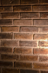 Brick wall with spot light and shadow