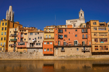Naklejka na ściany i meble Girona. Colorful houses on the river Onyar. Beautiful town of Girona, Catalonia, Spain