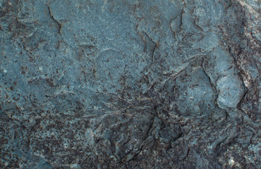 Pattern on a blue stone. Natural background. Stone texture