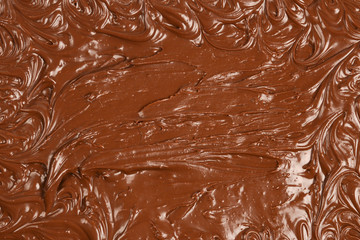 Chocolate cream background. Space for text or design.