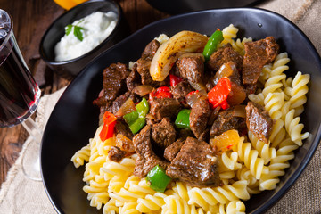 Fussili noodle with klaschise spicy goulash and paprika