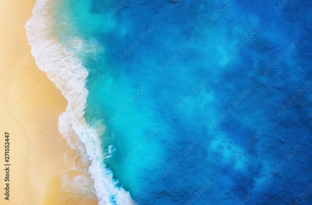 Wall mural coast as a background from top view. turquoise water background from top view. summer seascape from 