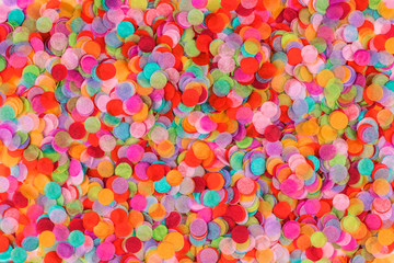 Fototapeta na wymiar Festive multicolored confetti background. Flat lay style.