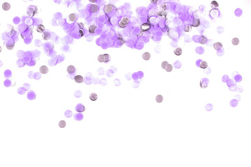 Delicate violet confetti isolated on white background.