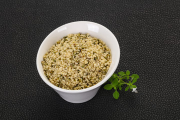 Peeled hemp seeds in the bowl