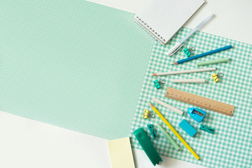 School stationery and objects on a white background with space for text. Back to school concept