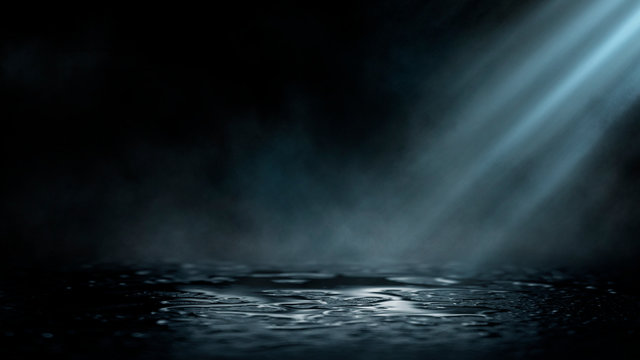 Empty street scene background with abstract spotlights light. Night view of street light reflected on water. Rays through the fog. Smoke, fog, wet asphalt with reflection of lights. © MiaStendal