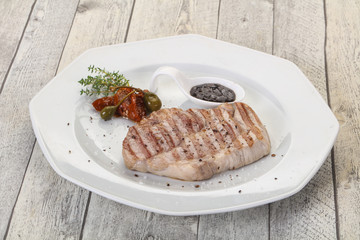 Grilled pork steak with pepper sauce