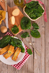 Potato croquettes with spinach and mozzarella. 