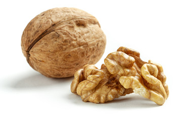 walnuts scattered on a white table
