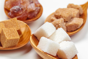 Different Kinds of Sugar in the Spoons close up