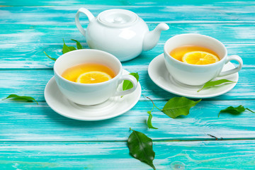 healthy herbal tea over blue background