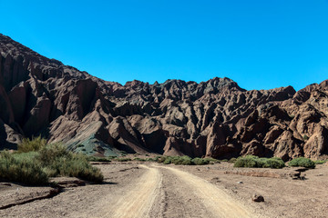 Road in the Rainbow Valley (Valle Arco-Iris) in the Atacama Desert of Chile, South America