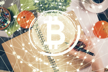 Cryptocurrency hologram over woman's hands writing background. Concept of blockchain. Multi exposure