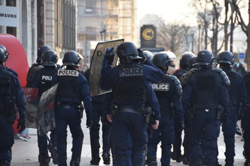 Police force photographed  in the street