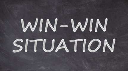 Win-win situation written on blackboard
