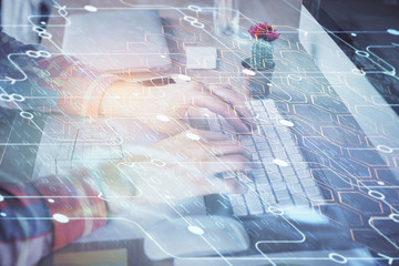 Businessman with computer background with technology theme hologram. Concept of big data. Double exposure.