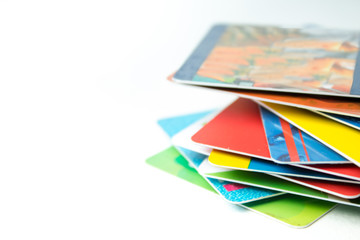 Stack of bank cards on a white background.