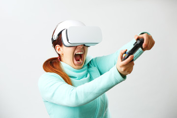 Fototapeta na wymiar Woman with virtual reality headset is playing game.