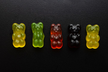 jelly bears on a black background
