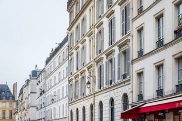 Fototapeta na wymiar PARIS, FRANCE - MARCH 31, 2019: Antique building view in Paris city, France.