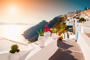Beautiful sunset at Santorini island, Greece. Famous travel destination. Luxury greek resort