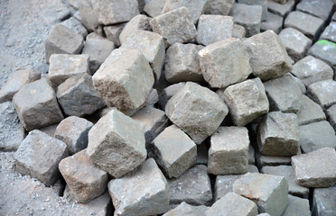 Old cobblestone pavement closeup.