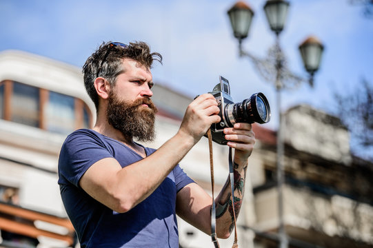 Say cheese. retro photographic equipment. photo of nature. reporter or journalist. Mature hipster with beard. Bearded man. hipster man in summer sunglasses. brutal photographer with camera - Powered by Adobe
