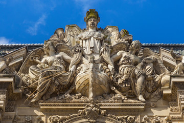 Gable of the Pavillon Turgot of the Louvre in Paris, France. Is the world's largest art museum and is housed in the Louvre Palace, originally built in the late 12th to 13th century.