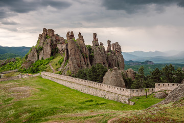 Beautiful view of the amazing rock formations and walls of a medieval fortress in Belogradchik,...