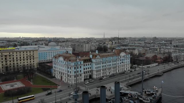 Aerial view in the central part of the city of Russia over the cruiser Aurora on the embankment of the Neva River in St. Petersburg