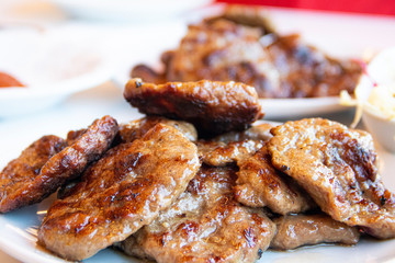 Turkish grilled meatballs on plate.