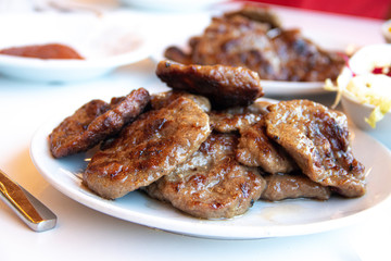 Turkish grilled meatballs on plate.