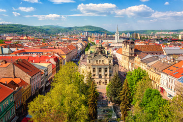 Fototapeta na wymiar Top view of Main street (Hlavna ulica) of Kosice Old city from St. Elisabeth Cathedral, with State theatre Košice (Statne divadlo) and medieval architecture, Slovakia (Slovensko)