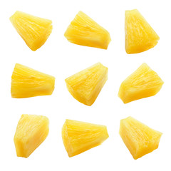 Canned pineapple chunks. Pineapple slices isolated. Set of pineapple chunks. Clipping path.
