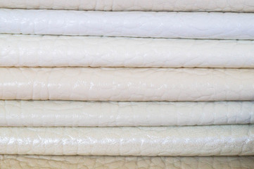 Catalog of multicolored imitation leather from matting fabric texture background, leatherette fabric texture. Industry background. 