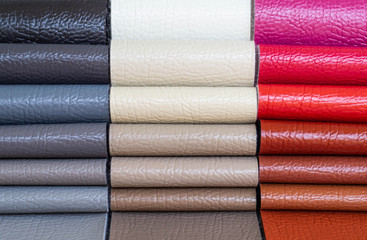 Catalog of multicolored imitation leather from matting fabric texture background, leatherette fabric texture. Industry background. 
