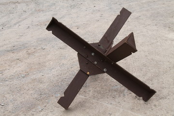 A Wartime Military Czech Hedgehog Anti Tank Barrier. © daseaford