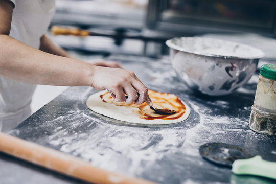 Close Up Shot Of Pizza Making Or Preparing Process