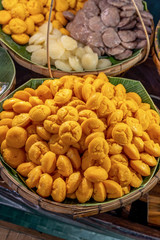 Toddy sweet sugar palm cake in palm leaves, Thai traditional dessert..