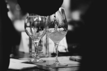 Glass of rose and white wine seen in close hand.