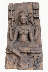 Fototapeta na wymiar Archaeological sculpture of Seated Tara, made of Khondalite rock. Circa tenth century of the Common Era, Lalitagiri, Odisha, India