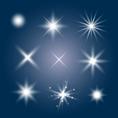 Glowing lights effect, flare, explosion and stars. Special effect isolated on blue background