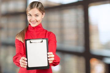 young business woman standing with her clipboard