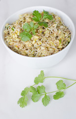 mung beans salad on white background, in a white deep plate
