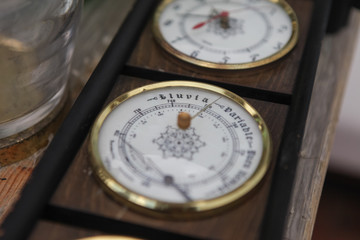 Vintage glass, decorative sculpture, details from flea market. Wooden decor, bottles, glasses, jars, clocks